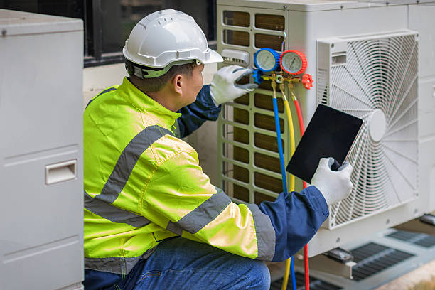 Professional Air Conditioning Repair technician working in Farmingdale, NY